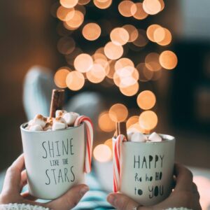 Warm up with festive hot chocolate topped with marshmallows and candy canes.